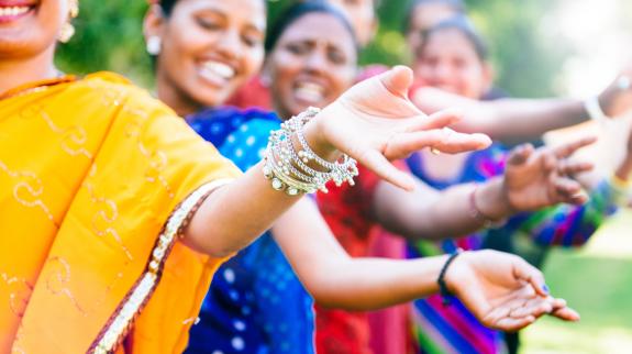 Group of Indian women rehearsing a Bollywood dance.